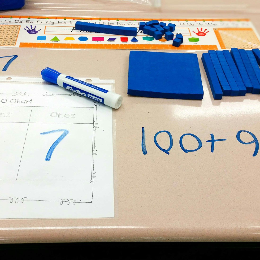 writing-math-problems-on-desk-with-expo-chisel-marker