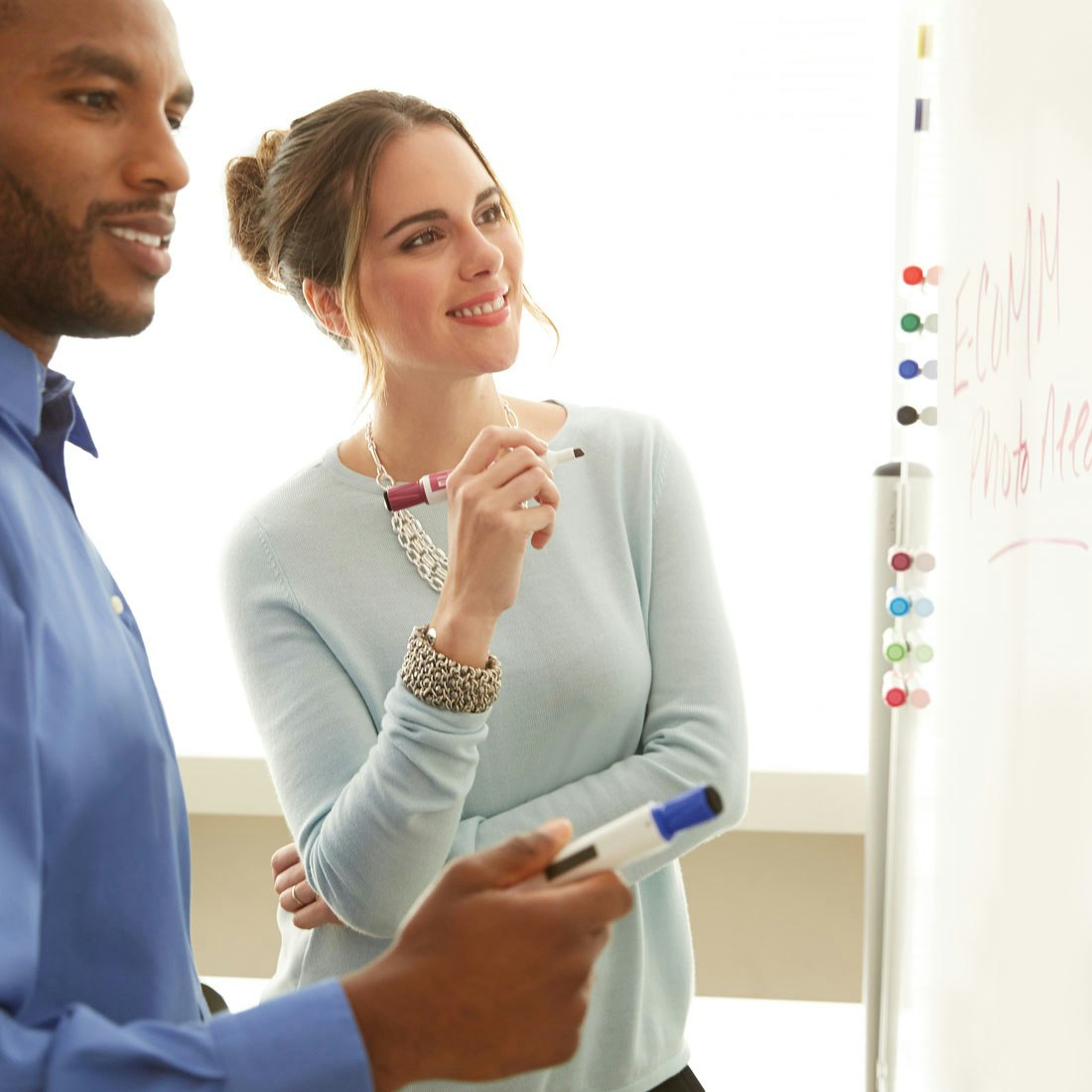 colleagues-collaborating-at-whiteboard.jpg