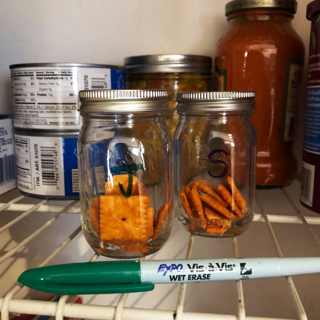 labeled-food-containers-on-shelf-with-expo-vis-a-vis-marker.jpg